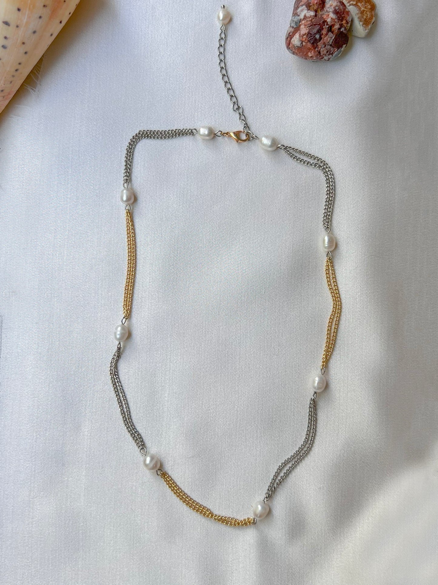 Necklace with freshwater pearls in a costume jewelry alloy